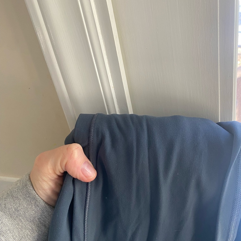 Athleta blue flare leggings with side pockets
